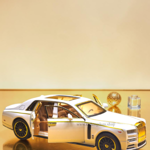White Rolls Royce Phantom diecast car with gold trim, opening doors, headlights, and sound box packaging