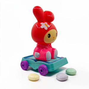 Pink bunny figure riding teal skateboard car with colorful flashing LED lights and omni-directional wheels