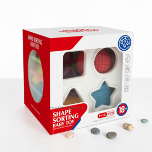 White shape sorter box with elastic bands and colorful textured sensory blocks