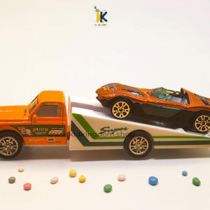 Orange alloy flatbed hauler truck carrying metallic convertible sports car toy
