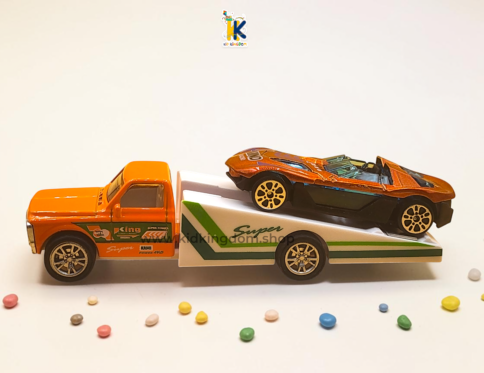 Orange alloy flatbed hauler truck carrying metallic convertible sports car toy