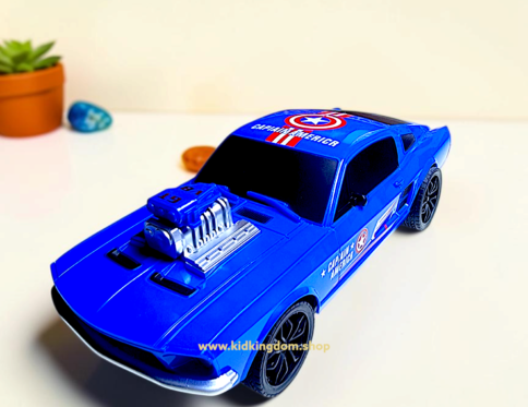 Close-up of exposed V8 engine and Captain America shield logo on blue toy muscle car