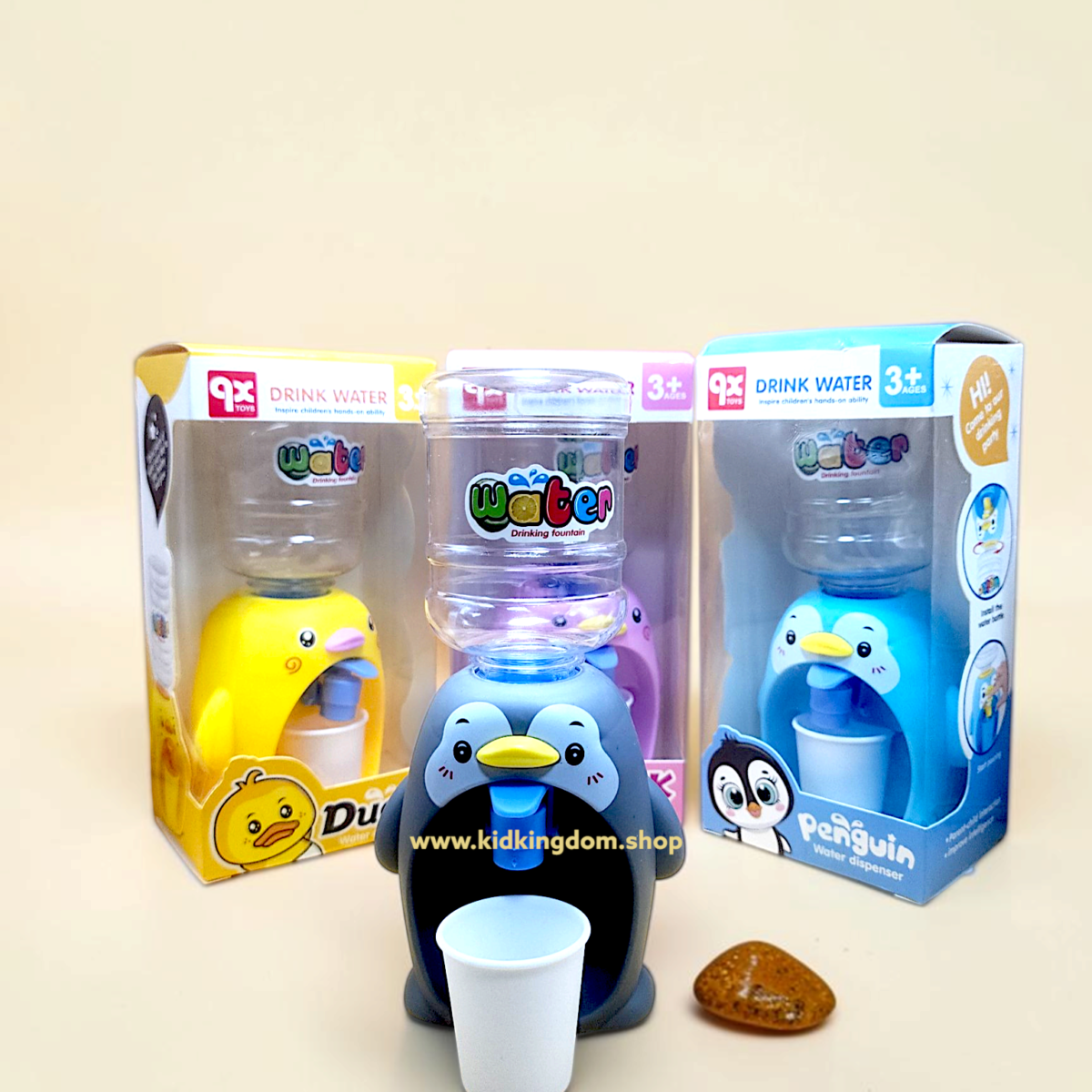 Boxed packaging display showing penguin and duck variants of mini water dispenser toys for kids