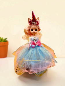 20260927_214221 Dancing princess doll wearing rainbow tulle gown and sparkling unicorn horn headband