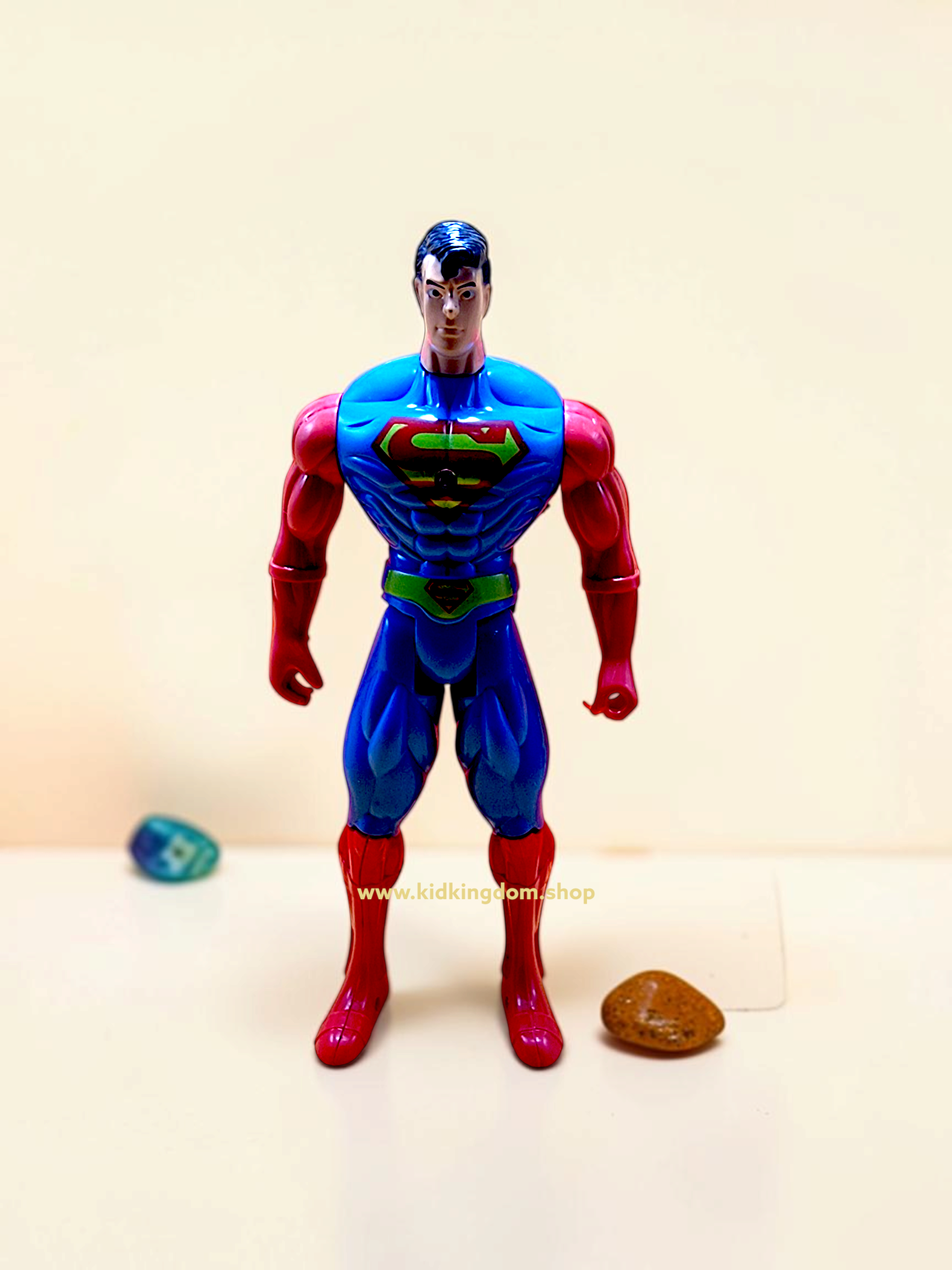 Front view of 8.5 inch Superman toy figure with chest emblem light module