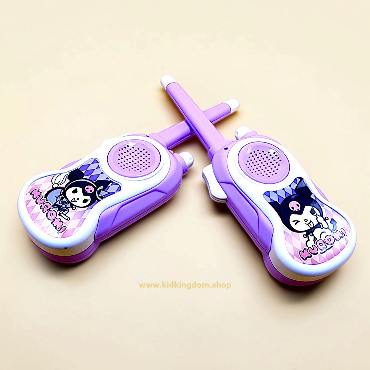 Two battery operated Kuromi walkie talkies crossed showing side push to talk button