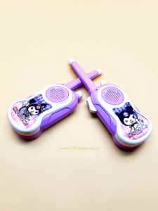 Two battery operated Kuromi walkie talkies crossed showing side push to talk button