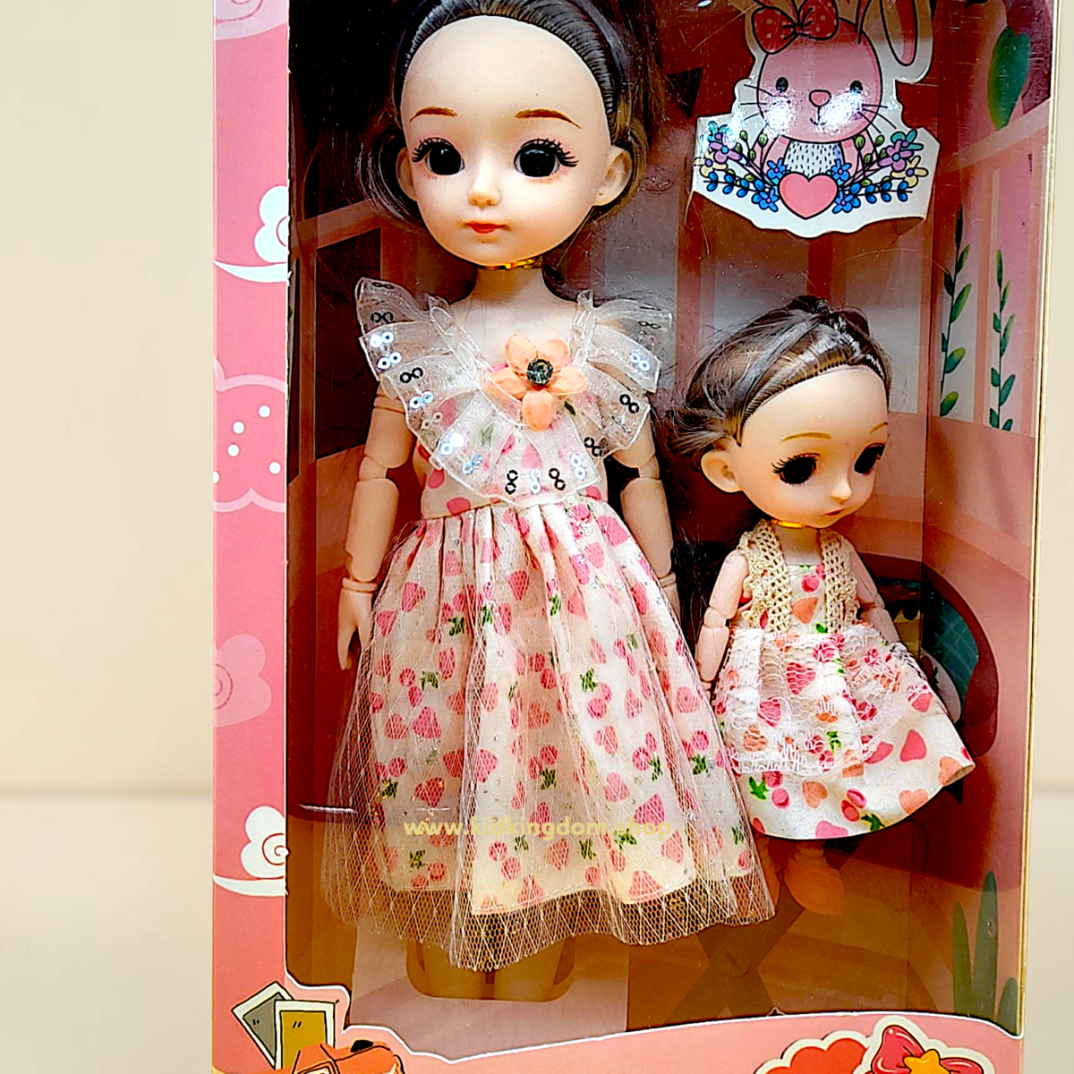 Silicone mother and sister doll set in pink window box packaging from Kid Kingdom