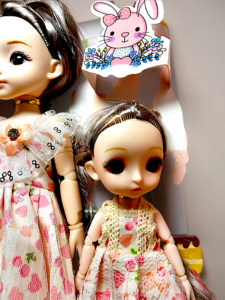 Articulated joints and expressive big eyes on silicone family doll set for pretend play