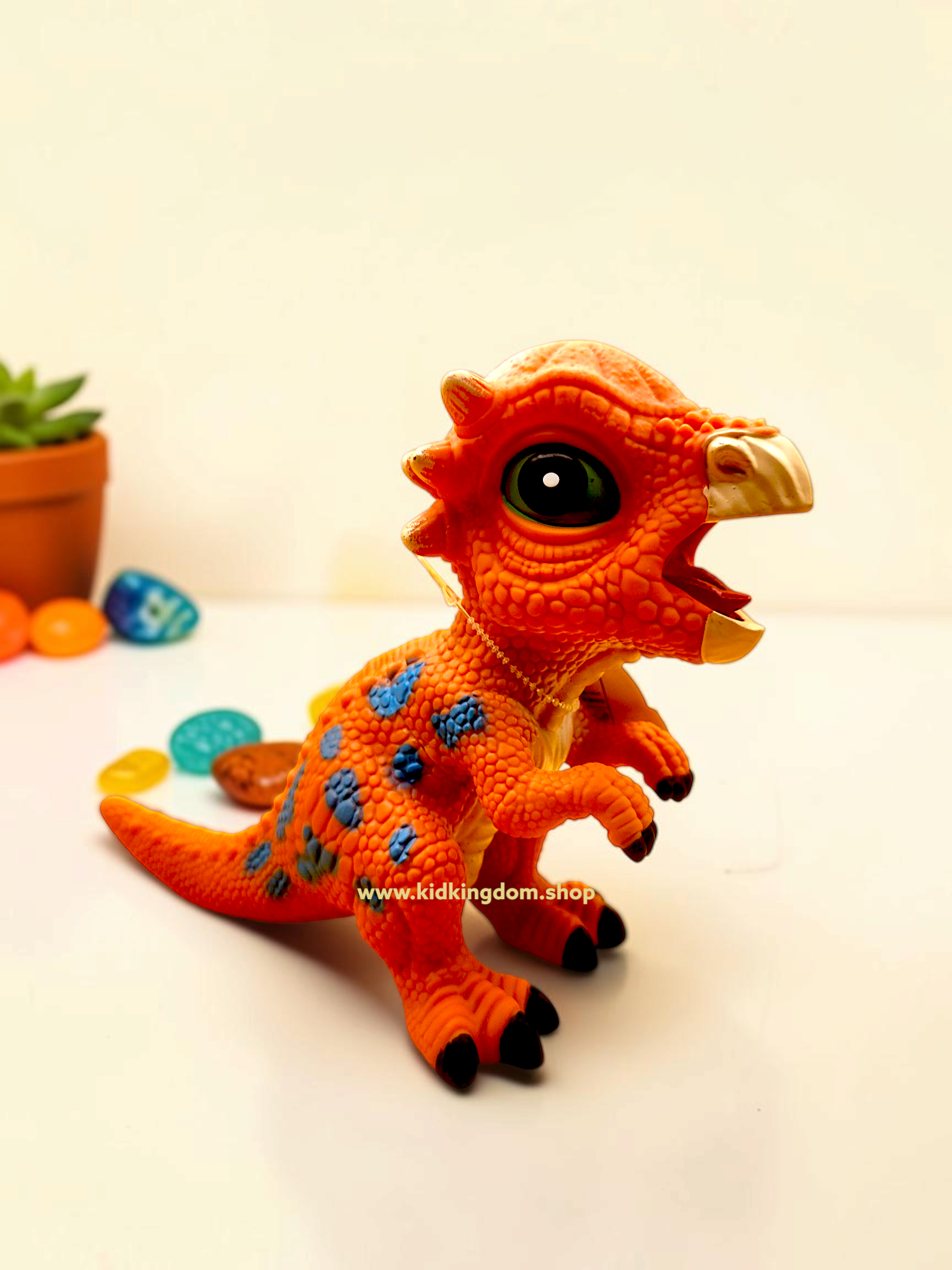Durable green Stegosaurus toy figure featuring flexible dorsal plates and detailed scales