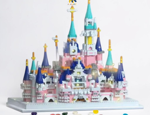 Night display view of fairytale palace model glowing with warm embedded LED string lights