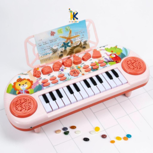 Close-up of instrument selector buttons, lion graphics, and drum pads on kids piano toy