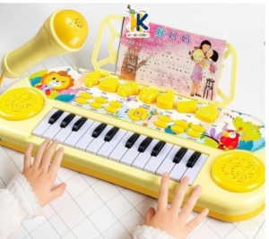 Pink multifunctional electronic piano keyboard toy with sheet music stand from Kid Kingdom