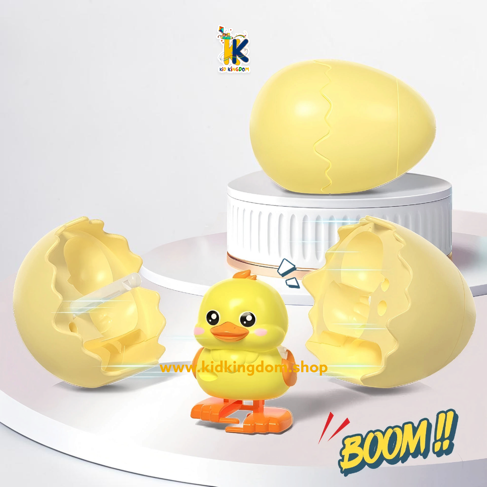 Image 2: Yellow wind up hatching egg popping open to reveal walking chick hatchling toy[cite: 18]